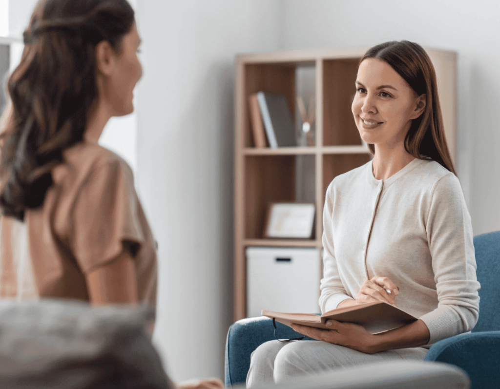 LGBTQ+ Mental Health: Therapist listens to patient. Counseling session for mental well-being in a safe, supportive environment.