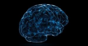 Digital 3D brain glow with blue neural pathways on black background—symbolic of neuroscience or brain activity.